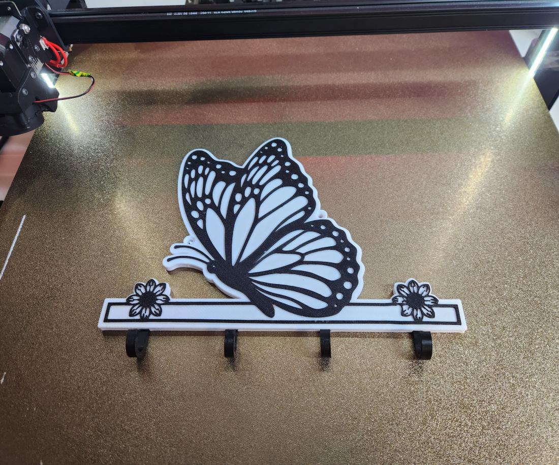 Support pour clé , torchons ou autre Papillon